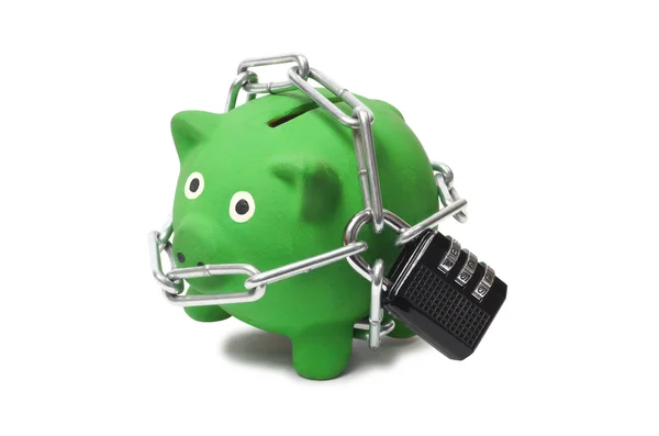 Zielony piggy bank w łańcuchach — Zdjęcie stockowe