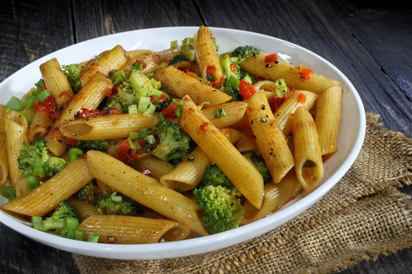 Pasta with broccoli,paprika and chives — Stock Photo, Image