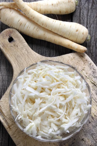 Bowl with grated parsley root — Stock Photo, Image