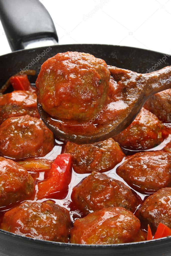 Pork meatballs in tomato sauce Stock Photo by ©papkin 34213303