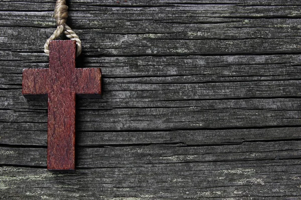 Achtergrond gemaakt van oude houten planken en kruis — Stockfoto