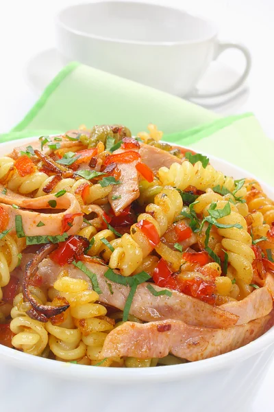 Fried pasta with pork ham and paprika — Stock Photo, Image