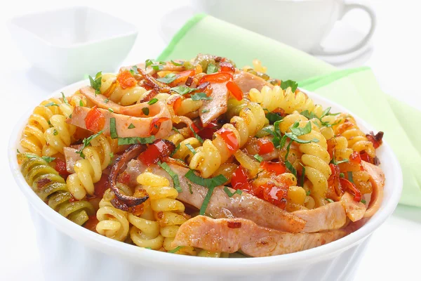 Fried pasta with pork ham and paprika — Stock Photo, Image