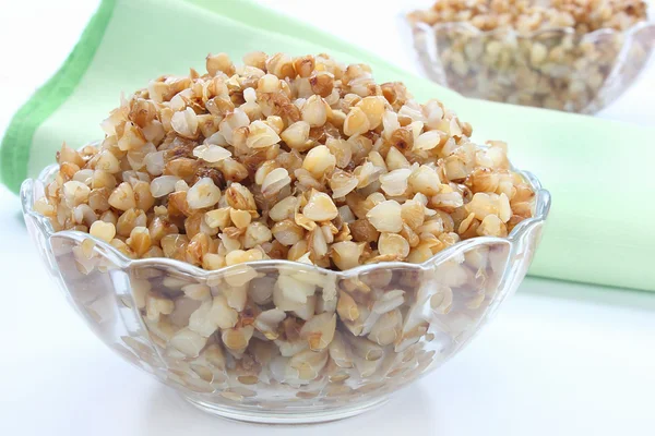 Cooked buckwheat in the glass bowl — Stock Photo, Image