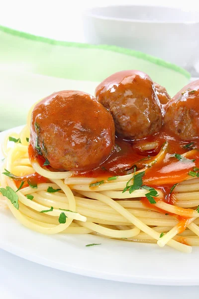 Fried pork meatballs with pasta — Stock Photo, Image