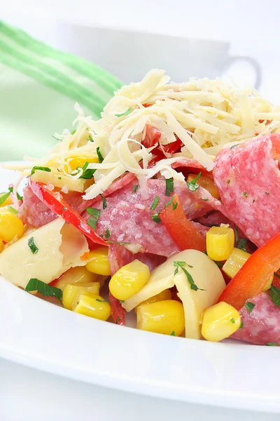 Salad with salami, cheese, paprika and sweet corn — Stock Photo, Image