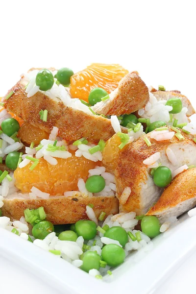 Salad with chicken, rice, mandarin and green peas — Stock Photo, Image