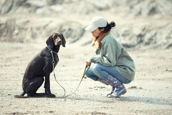Dog and tamer — Stok fotoğraf