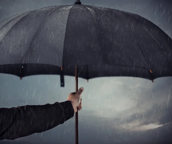 Umbrella under the rain — Stock Photo, Image