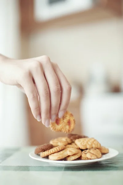 Tomando galletas — Foto de Stock