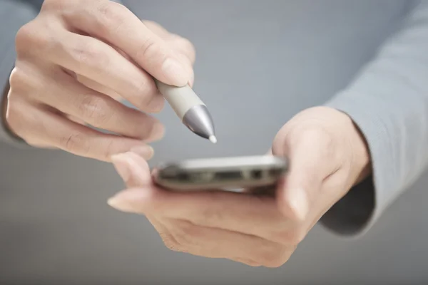 Smartphone and stylus — Stock Photo, Image