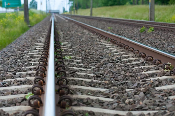 Detalhe das vias férreas ferroviárias para trens — Fotografia de Stock