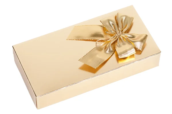 Golden gift box with a bow on a white background — Stock Photo, Image