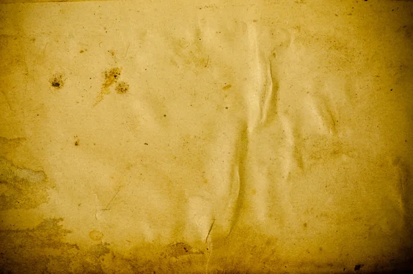 Старый темно-коричневый бумажный фон с царапинами — стоковое фото
