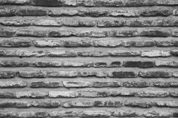 Темная кирпичная стена — стоковое фото