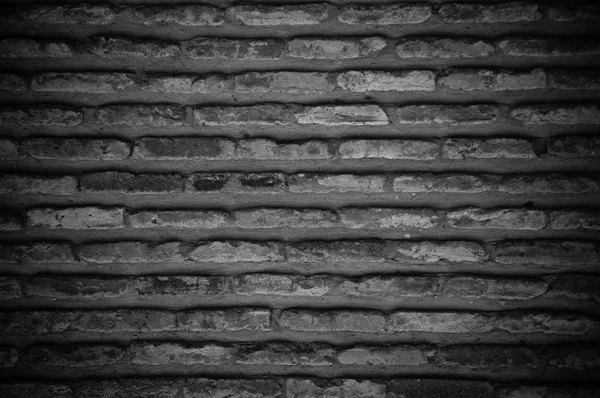 Textura de pared de ladrillo viejo oscuro — Foto de Stock