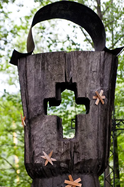 Wooden cross part of the tombstone in a cemetery — Stock Photo, Image