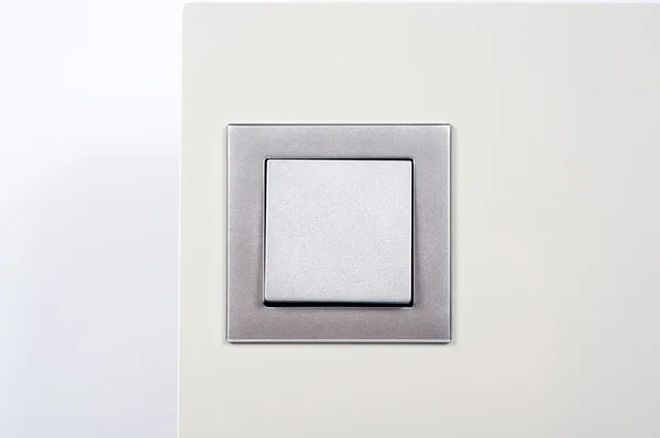 Modern light switch on the wall close up — Stock Photo, Image