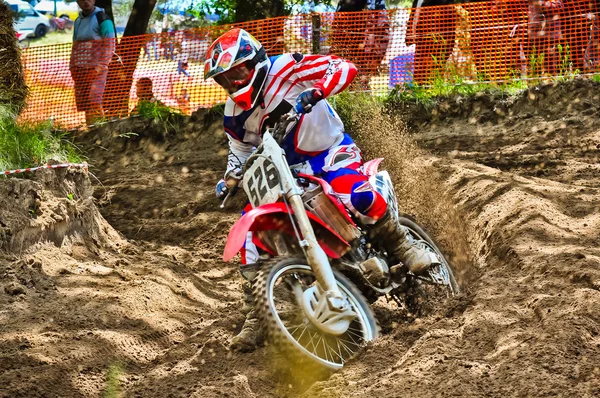 Motocross piloto em corrida campeonato — Fotografia de Stock