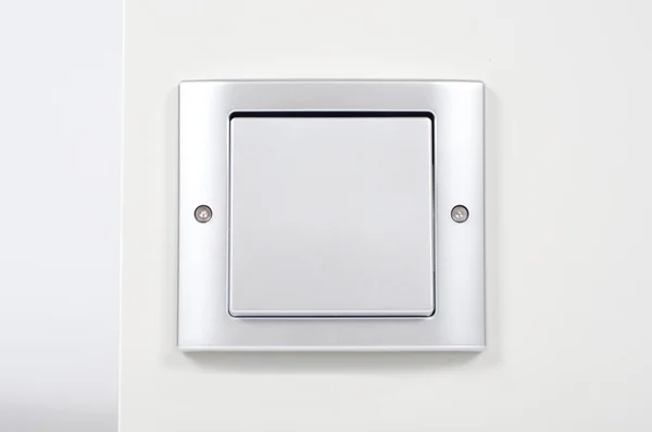 Modern light switch on the wall close up — Stock Photo, Image