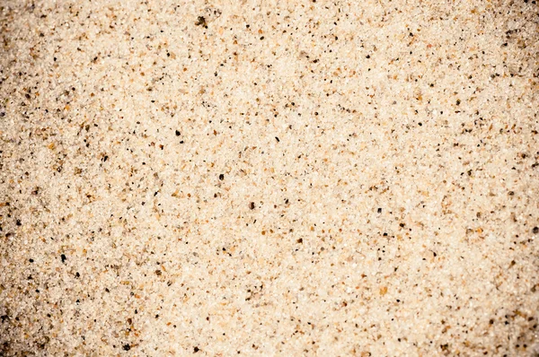 Coarse sand background texture. Macro of coarse sand grains — Stock Photo, Image
