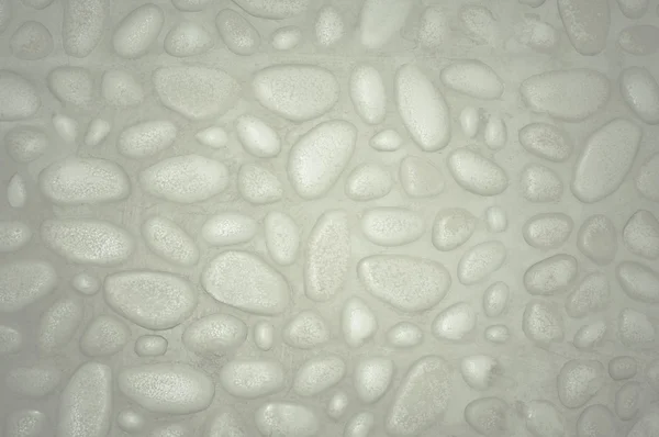 Текстурований кам'яний фон стіни з дрібними каменями і цементом — стокове фото