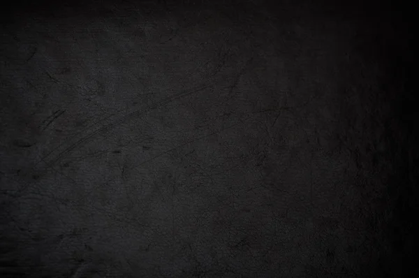 Grunge scuro in pelle graffiata da usare come sfondo — Foto Stock