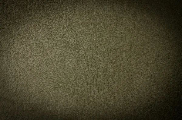 Dark grunge scratched leather to use as background — Stock Photo, Image