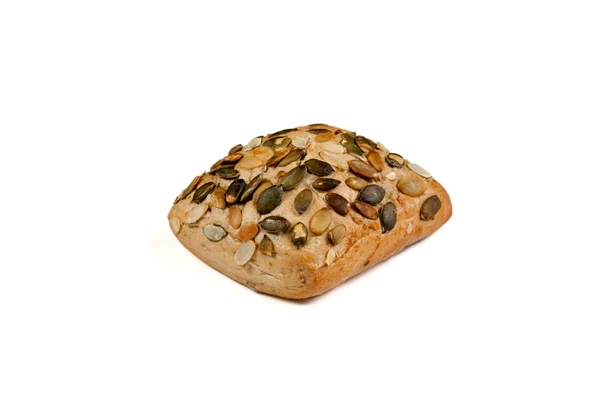 One roll bread with pumpkin seeds on white background — Stock Photo, Image