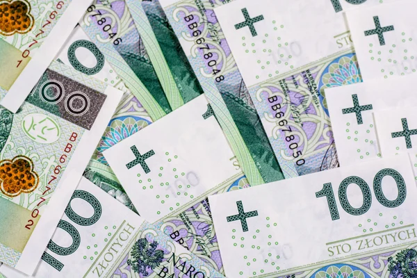 A 100 PLN (lengyel zloty) bankjegyek háttere — Stock Fotó