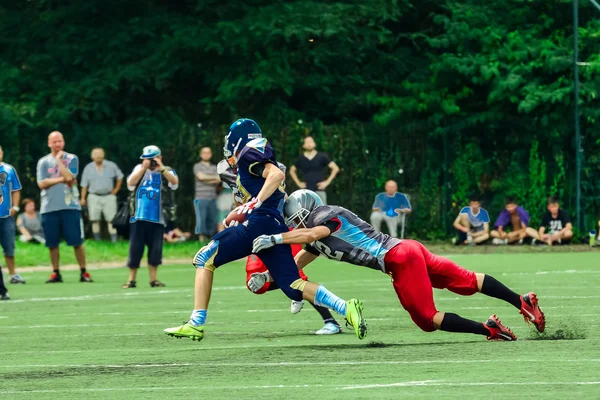 Američtí fotbalisté v akci — Stock fotografie