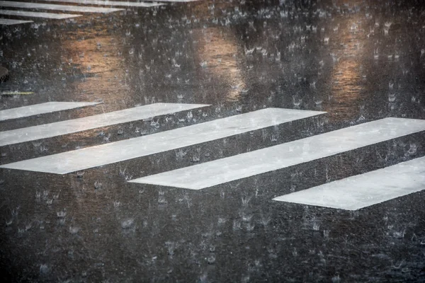 Pedestrian crossing during the big rainstorm — Stock Photo, Image