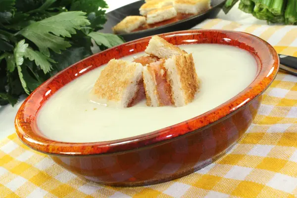 Fresh Cream of celery soup with salmon croutons — Stock Photo, Image