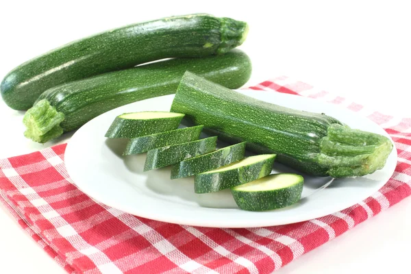 Fresh zucchini on a napkin — Stock Photo, Image