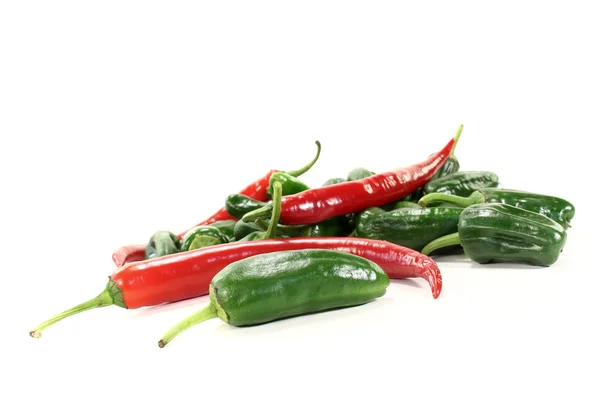 Green Pimientos with red hot peppers — Stock Photo, Image