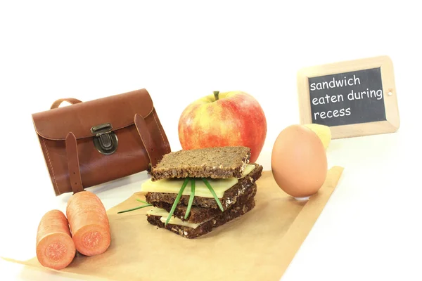 Sandwich eaten during break with apple — Stock Photo, Image