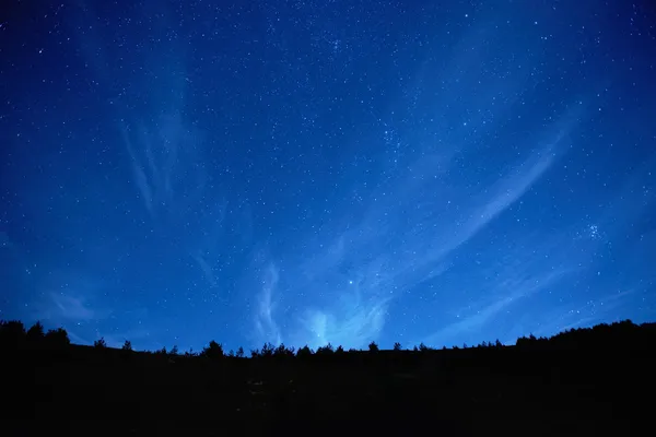 Blu scuro cielo notturno con stelle . — Foto Stock