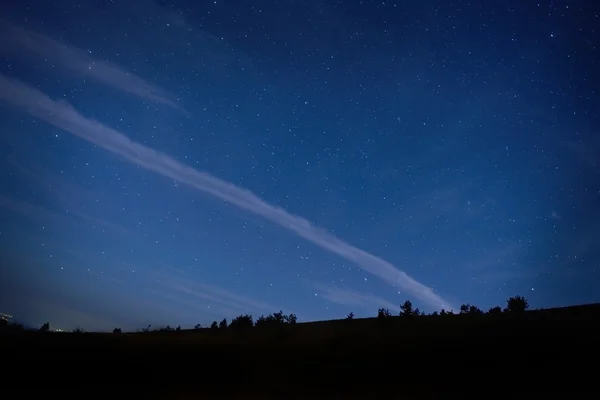 Blu scuro cielo notturno con stelle . — Foto Stock