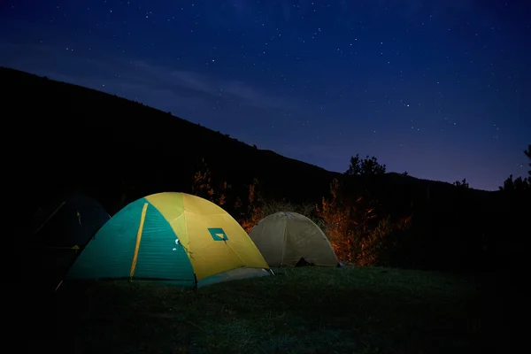 Illuminated yellow camping tent — Stock Photo, Image