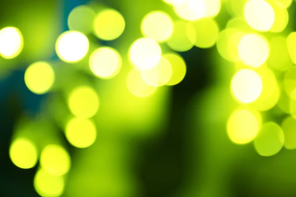 Holiday abstract green and yellow lights — Stock Photo, Image
