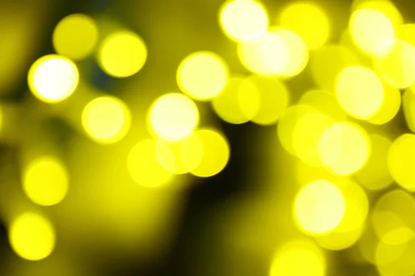 Holiday abstract green and yellow lights — Stock Photo, Image