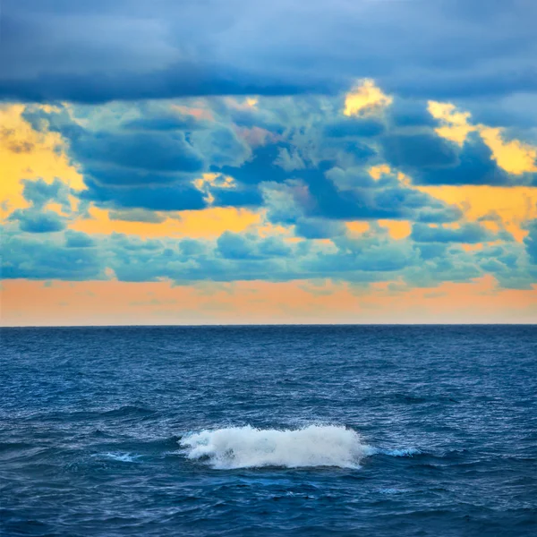 Big wave over colorful sunset — Stock Photo, Image