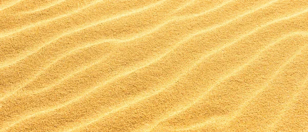 黄沙滩沙漠背景下的砂质全景质感 — 图库照片
