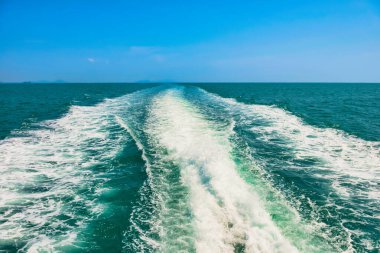 Wave on sea from speed boat on blue sea