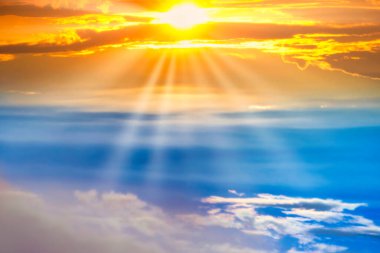 Sunset sky with sun light and sunset clouds
