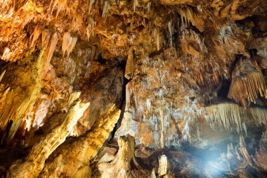 Dark cave with many stalactites. Grotte di Is Zuddas cave, Italy, Sardinia