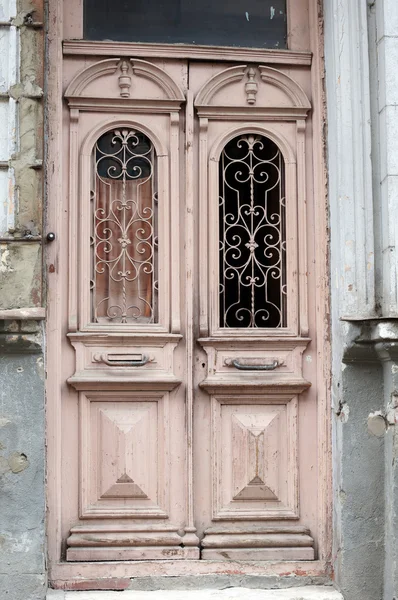 Old wooden door in antique house — Stock Photo, Image