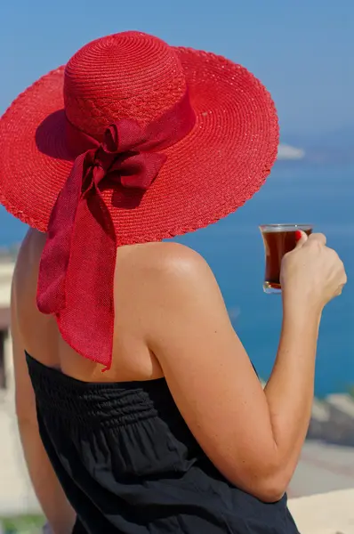 Portrait of woman in a straw hat — Stock Photo, Image