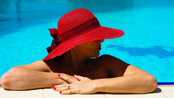 Woman in a pool — Stock Photo, Image