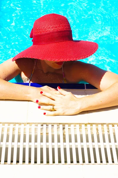 Woman in a pool — Stock Photo, Image